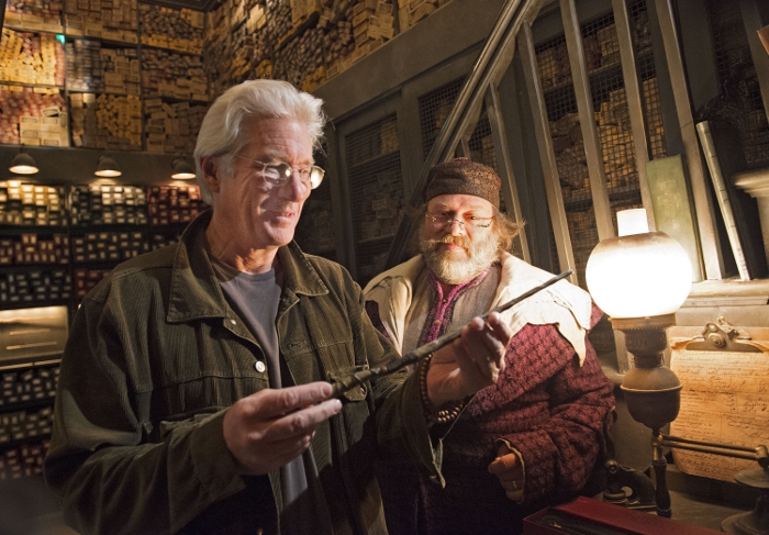 "On Mar. 8, 2014, Golden Globe award-winning actor Richard Gere visited Ollivanders wand shop at The Wizarding World of Harry Potter – Hogsmeade at Universal Orlando Resort. During his hosted visit, Gere visited the premier wand shop and experienced the wonder of the wand choosing him. Gere is best known for his roles in such blockbuster films as “Chicago,” “Pretty Woman” and “An Officer and a Gentleman.” The Wizarding World of Harry Potter – Hogsmeade – located at Universal’s Islands of Adventure – opened in 2010 and is home to Hogsmeade village and the iconic Hogwarts castle, which houses the groundbreaking Harry Potter and the Forbidden Journey attraction. This summer, The Wizarding World of Harry Potter – Diagon Alley will open at Universal Studios Florida, bringing even more of Harry Potter’s adventures to life. HARRY POTTER, characters, names and related indicia are trademarks of and © Warner Bros. Entertainment Inc. Harry Potter Publishing Rights © JKR.  (s14) © 2014 Universal Orlando Resort. All rights reserved."
